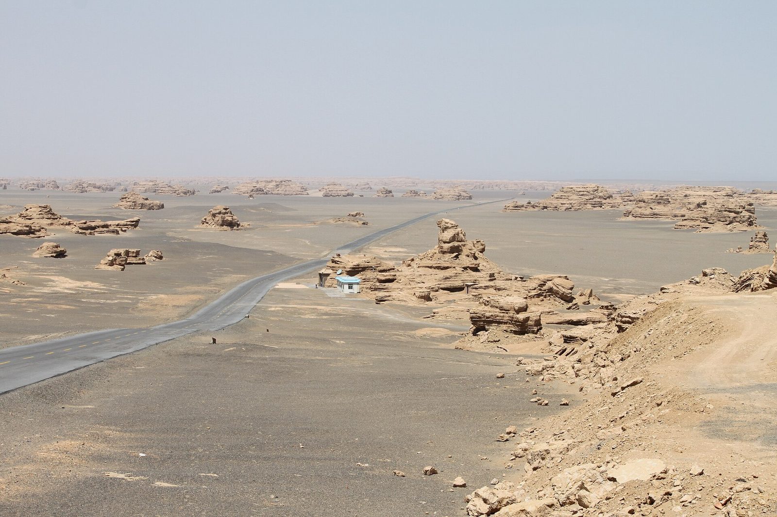 Desert landscape and rock formations in Dunhuang Yardang National Geopark — near Ganshu, in Xinjiang, western China.