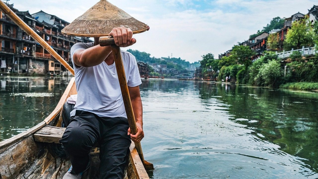 man  fisher  river  row  rowing  paddle  paddling  ancient town  fenghuang  china  boat  rowing boat  china  china  china  china  china