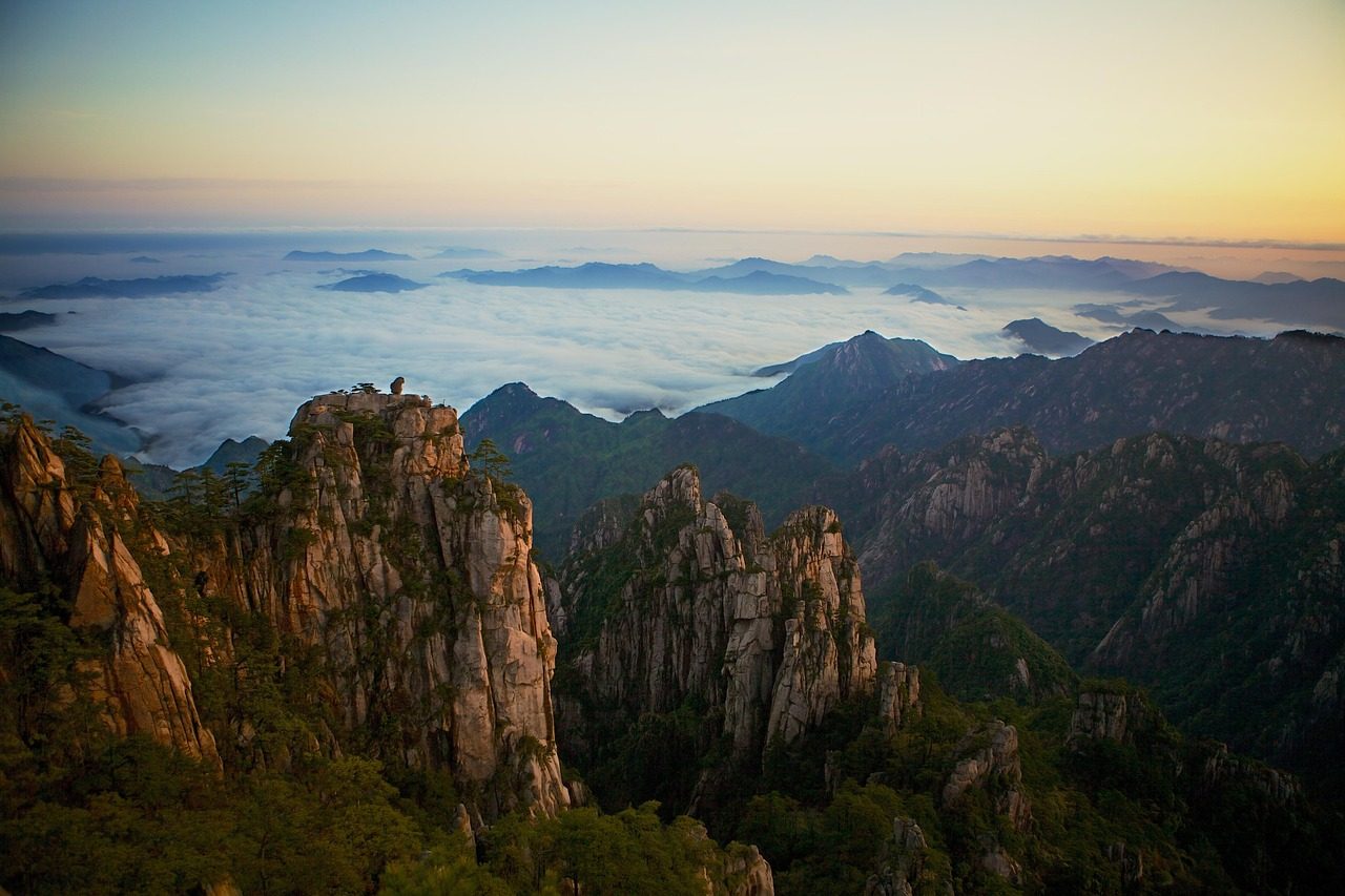 yellow mountains  mountain ranges  sea of clouds  horizon  mountainous  mountain landscape  landscape  china  travel  scenic  sunset  nature  rural  countryside