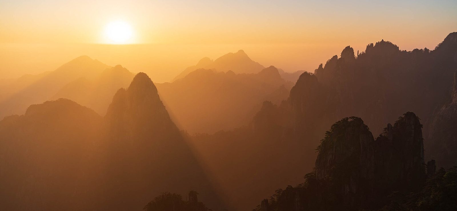 Sunrise from Houziguanhai, Huangshan Mountains, China.
