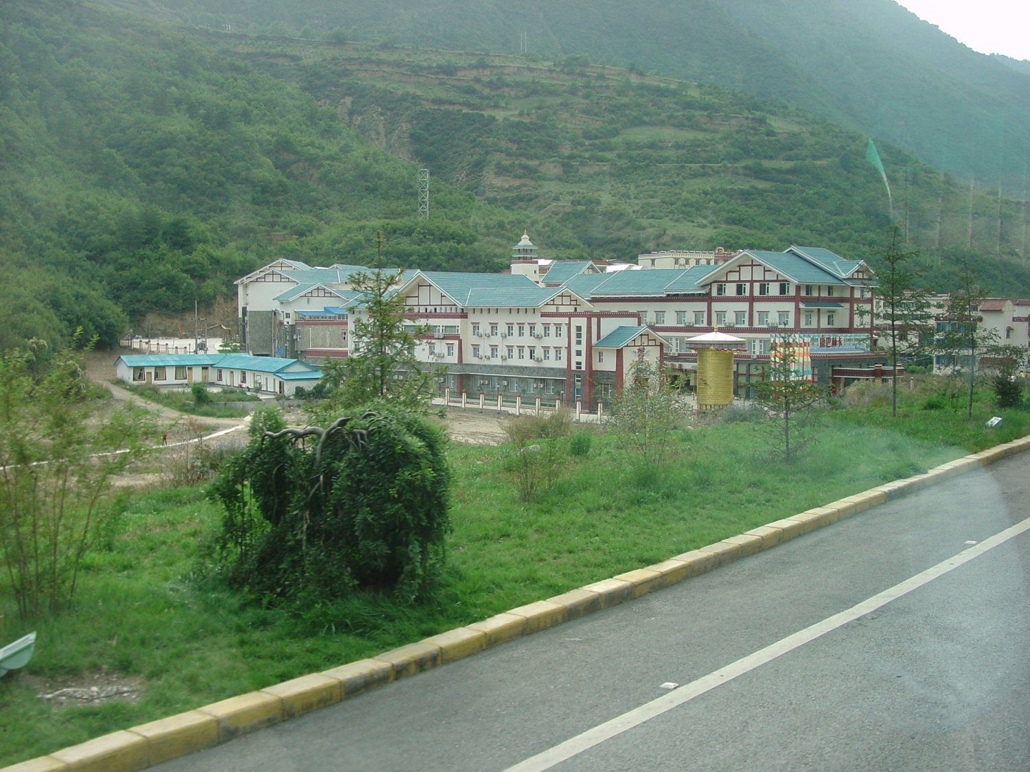 Jiuzhaigou town. The first buildings seen as you approach Jiuzhaigou from the south, Jiuzhaigou.