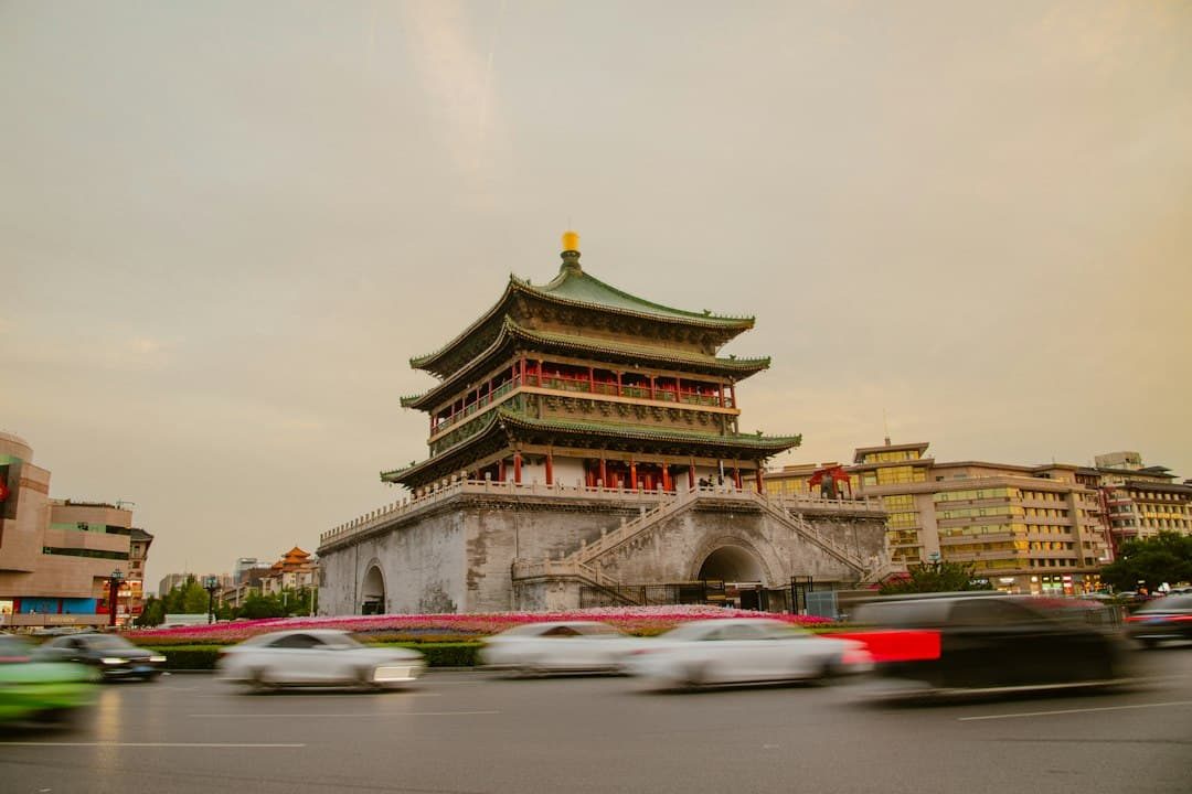 Xi'an bell tower at dusk with blurred city traffic